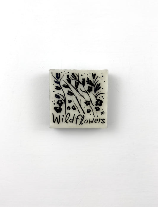 Small Original painting with black floral design and 'Wildflowers' text on a white background
