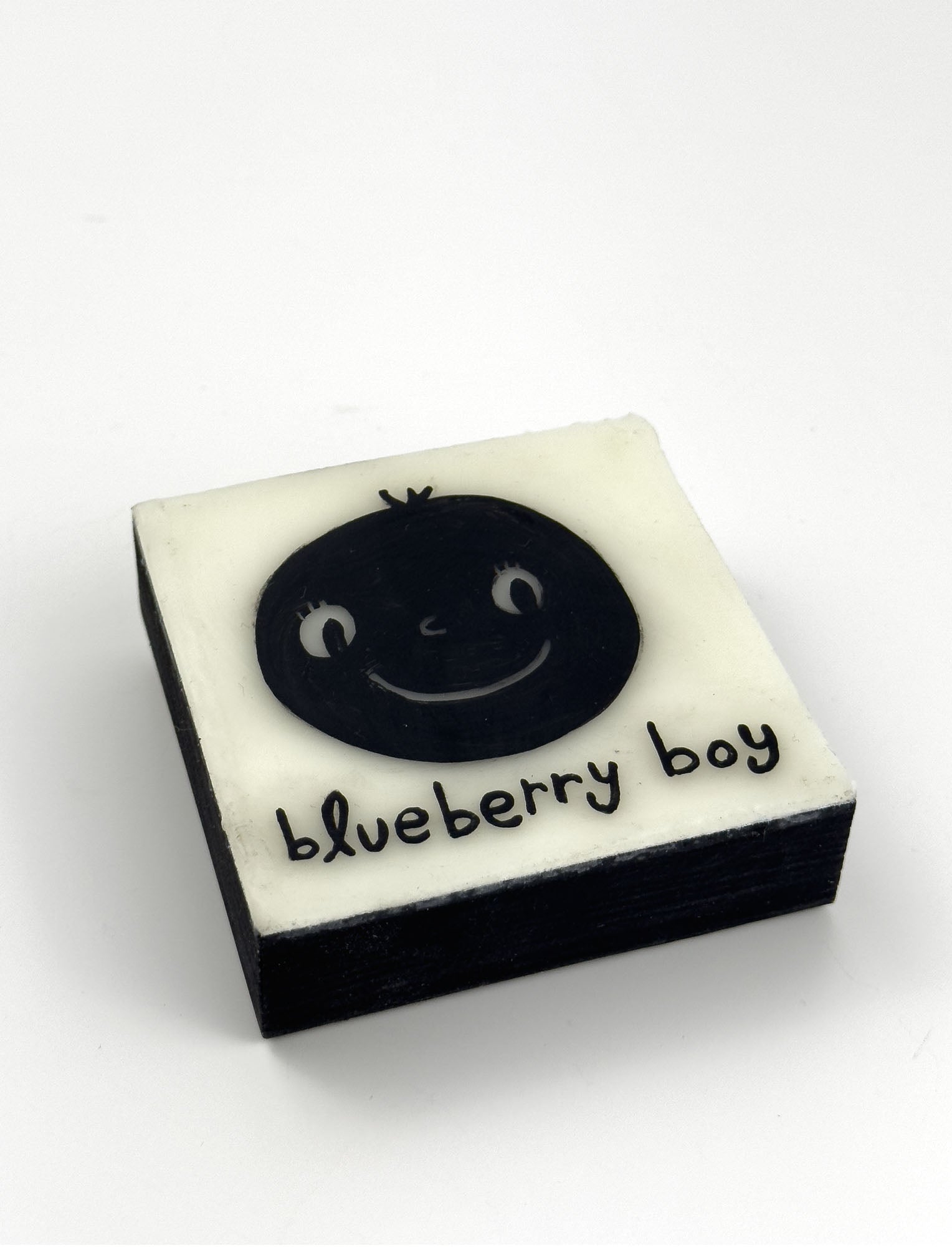 Original painting with a black character face and 'blueberry boy' text on a white background