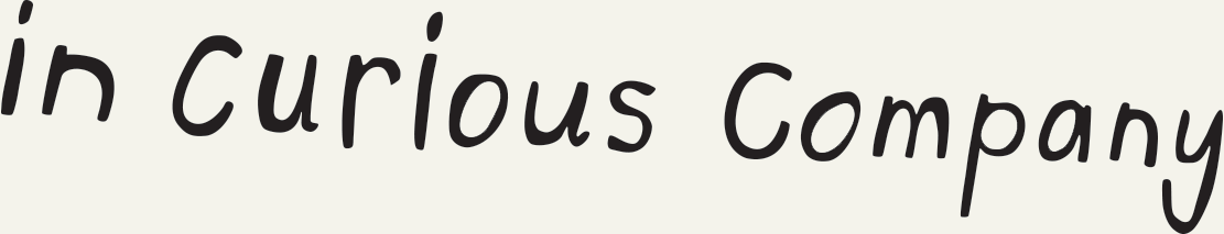 Text 'in Curious Company' in a handwritten style on a white background